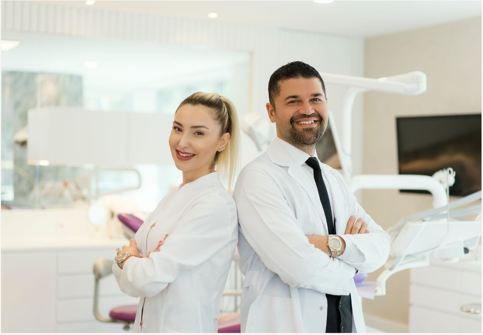 Doctors standing back to back Dental accounting